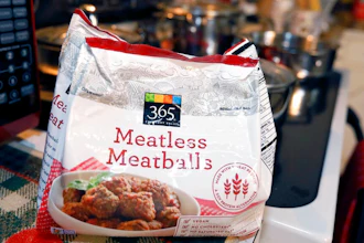 This July 2, 2019, file photo shows a bag of 'meatless meatballs'. Mississippi is considering new rules that let companies continue to use food-labeling terms such as “veggie burger” and “vegan bacon,” as long as the terms are prominently displayed so consumers understand the products are not meat. The state agriculture department on Thursday, Sept. 5, 2019, proposed new regulations for plant-based products that are sold as alternatives to meat. The regulations came in response to a lawsuit filed by a nonprofit organization advocating plant-based foods and an Illinois food company. The lawsuit was filed on July 1, the same day the state enacted a law dictating that 'a plant-based or insect-based food product shall not be labeled as meat or a meat food product.'