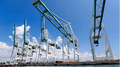 In this July 24, 2019 photo, large cranes to unload container ships are shown at PortMiami in Miami. On Thursday, Sept. 5, the Labor Department issues revised data on productivity in the second quarter.