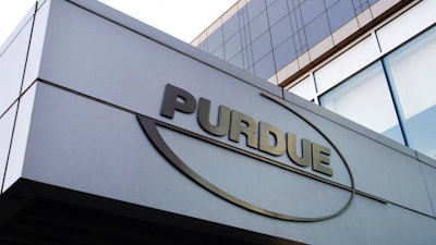 This May 8, 2007, file photo shows the Purdue Pharma logo at its offices in Stamford, Conn. It’s not entirely clear what a bankruptcy filing for Purdue Pharma would mean for the wealth of the Sackler family behind the business. Depending on how various legal actions proceed, the billionaire family could be on the hook for much more than outlined in the settlement.