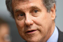 In this March 3, 2019 file photo, Sen. Sherrod Brown, D-Ohio, speaks to reporters during the Martin Luther and Coretta Scott King Unity Breakfast in Selma, Ala. Brown is rolling out a proposal that would force employers to warn workers and retrain them when their jobs are about to be eliminated by automation.