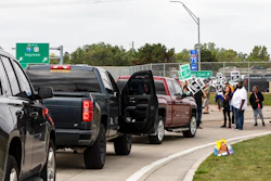 Protesting union members prevent cars from driving into the General Motors Flint Assembly Plant on Bristol Road as United Automobile Workers remain on strike against GM on Tuesday, Sept. 17, 2019, in Flint, Mich. GM and the union are faced with weakening vehicle sales, a deteriorating global economy and an unpredictable trade war.