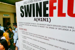 In this June 19, 2009, file photo, a large billboard is displayed at the entrance of a university as security guards use a thermal scanner to check on students temperature before allowing them to enter the school premise in Manila, Philippines. On Monday, Sept. 9, 2019, Philippine officials say lab tests have confirmed African swine fever caused the deaths of pig herds in at least seven villages and a multi-agency force will be set up to try to contain the contagious disease.