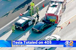 This Jan. 22, 2018, file still frame from video provided by KCBS-TV shows a Tesla Model S electric car that has crashed into a fire engine on Interstate 405 in Culver City, Calif. A government report says the driver of the Tesla that slammed into a firetruck was using the car’s Autopilot system when a vehicle in front of him suddenly changed lanes and he didn’t have time to react. The National Transportation Safety Board said Tuesday, Sept. 3, 2019, that the driver never saw the parked firetruck and didn’t brake.