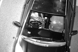 This Jan. 12, 2019, photo captured by a Mobile Phone Detection Camera and released by Transport for NSW shows a driver using a mobile phone while driving in Australia. Australian state New South Wales is attempting to persuade the public to put down their smartphones while driving by rolling out cameras to prosecute distracted motorists. New South Wales Roads Minister Andrew Constance said on Monday, Sept. 23, 2019, Australia’s most populous state was the first jurisdiction in the world to use such technology to punish drivers distracted by social media, text messages or phone calls. The government intends to roll out 45 Mobile Phone Detection Cameras across the state by December, he said.