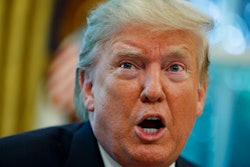 President Donald Trump talks with reporters after receiving a briefing on Hurricane Dorian in the Oval Office of the White House, Wednesday, Sept. 4, 2019, in Washington.