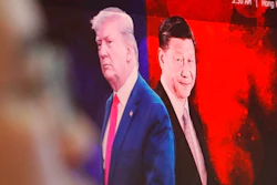 In this Aug. 26, 2019, file photo, a computer screen shows images of Chinese President Xi Jinping, right, and U.S. President Donald Trump as a currency trader works at the foreign exchange dealing room of the KEB Hana Bank headquarters in Seoul, South Korea. China will lift punitive tariffs imposed on U.S. soybeans and pork in a trade war with Washington, a state news agency said Friday, Sept. 13, 2019, in a possible goodwill gesture ahead of negotiations.