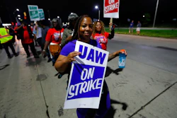 United Auto Workers members picket outside the General Motors Detroit-Hamtramck assembly plant in Hamtramck, Mich., early Monday, Sept. 16, 2019. Roughly 49,000 workers at General Motors plants in the U.S. planned to strike just before midnight Sunday, but talks between the UAW and the automaker will resume.