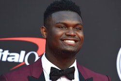 In this July 10, 2019 file photo, Zion Williamson, of the Duke University Basketball team, arrives at the ESPY Awards at the Microsoft Theater in Los Angeles. Duke says an investigation has found no evidence that Williamson received improper benefits. School spokesman Michael Schoenfeld said in a statement Saturday, Sept. 7, that a 'thorough and objective' probe led by investigators outside the athletic department found 'no evidence to support any allegation' that would have jeopardized Williamson's eligibility.