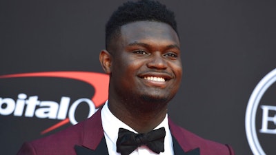 In this July 10, 2019 file photo, Zion Williamson, of the Duke University Basketball team, arrives at the ESPY Awards at the Microsoft Theater in Los Angeles. Duke says an investigation has found no evidence that Williamson received improper benefits. School spokesman Michael Schoenfeld said in a statement Saturday, Sept. 7, that a 'thorough and objective' probe led by investigators outside the athletic department found 'no evidence to support any allegation' that would have jeopardized Williamson's eligibility.