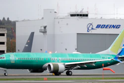 In this April 10, 2019, file photo a Boeing 737 MAX 8 airplane being built for Spain-based Air Europa rolls toward takeoff before a test flight at Boeing Field in Seattle. The head of the Federal Aviation Administration is defending his agency's approval of a troubled Boeing plane while leaving open the possibility of changing how the agency certifies aircraft. Stephen Dickson made the comments Monday, Sept. 23, in Montreal, where he and other top FAA officials briefed aviation regulators from around the world on the agency's review of changes that Boeing is making to the 737 Max. The FAA said a senior Boeing official also gave a technical briefing.