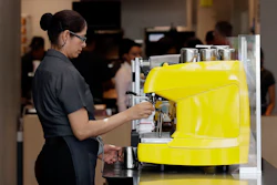 In this Aug. 8, 2018, photo an employee works at a McDonald's restaurant in Chicago. The Trump administration has issued a rule that will make overtime pay available to 1.3 million additional workers, though the proposal replaces a more generous one advanced by former President Barack Obama. The Labor Department said Tuesday, Sept. 24, 20119, that it is raising the salary level that companies will have to pay to exempt workers from overtime to $35,308 a year, up from $23,660.
