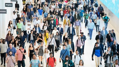 In this June 21, 2019, file photo commuters walk through a corridor in the World Trade Center Transportation Hub in New York. Millennial workers are more likely than older generations to report being burned out at work, according to a 2018 Gallup study. The gig economy, the temptations of social media and the high expectations millennials have of themselves contribute to this trend, behavioral finance experts say. (AP Photo/Mark Lennihan, File)In this June 21, 2019, file photo commuters walk through a corridor in the World Trade Center Transportation Hub in New York. Millennial workers are more likely than older generations to report being burned out at work, according to a 2018 Gallup study. The gig economy, the temptations of social media and the high expectations millennials have of themselves contribute to this trend, behavioral finance experts say.