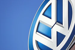 In this Wednesday, Aug. 1, 2018 file photo, the logo of Volkswagen is seen on top of a company building in Wolfsburg, Germany. German prosecutors say they have charged Volkswagen chief executive Herbert Diess and chairman Hans Dieter Poetsch, along with former CEO Martin Winterkorn, with market manipulation in connection with the diesel emissions scandal that erupted in 2015.