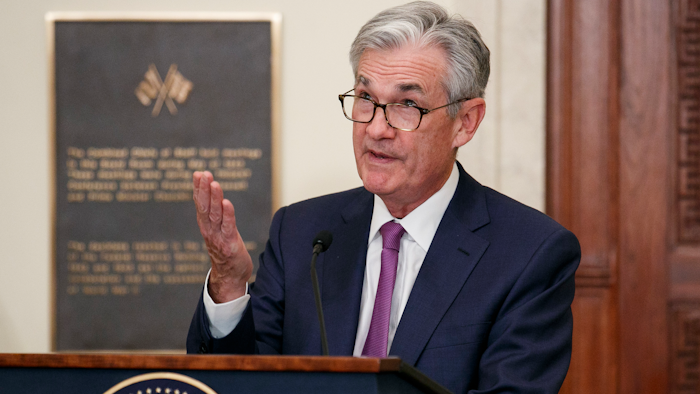 Federal Reserve Chairman Jerome Powell speaks before attending a panel at the Federal Reserve Board Building Friday in Washington.