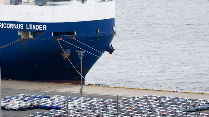 In this July 8, 2019, photo, cars for export are parked at Kawasaki port, near of Tokyo. Japan has logged a third straight month of a trade deficit in September, according to the latest government data, as trade tensions between China and the U.S. crimped exports. Japan’s Finance Ministry reported Monday, Oct. 21, the nation’s trade deficit in September totaled 122.98 billion yen ($1.13 billion).