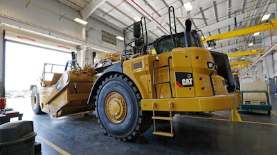 In this Sept. 18, 2019 photo, a new heavy duty Caterpillar grader awaits modification at Puckett Machinery Company in Flowood, MS.