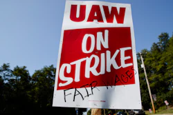 Workers picket outside a General Motors facility in Langhorne, PA on Sept. 23.