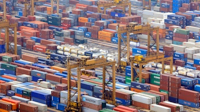 In this March 10, 2010 file photo, containers are seen at a port in Singapore.