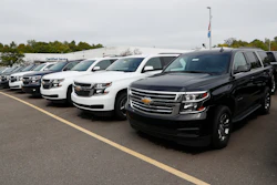 In this Sept. 30, 2019 photo, a row of Chevrolet Suburban vehicles are shown at Wally Edgar Chevrolet in Orion Township, MI