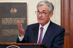 Federal Reserve Chairman Jerome Powell speaks before attending a panel at the Federal Reserve Board Building Friday in Washington.