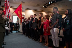 First lady Melania Trump, center, and acting DEA Administrator Uttam Dhillon, center left, stands at a Red Ribbon Rally at the Drug Enforcement Agency in Arlington, VA, on Monday, Oct. 7. Also pictured is Mika Camarena, third from right, the wife of former DEA agent Kiki Camarena who was killed in 1985 while on assignment in Mexico.