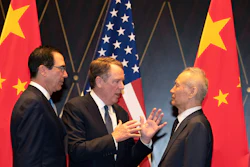 In this on Wednesday, July 31, 2019 file photo, U.S. Trade Representative Robert Lighthizer, center, gestures as he chats with Chinese Vice Premier Liu He, right, with Treasury Secretary Steven Mnuchin, left, looking on after posing for a photo at the Xijiao Conference Center in Shanghai.