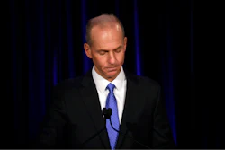 In this April 29, 2019, file pool photo, Boeing Chief Executive Dennis Muilenburg speaks at a news conference after company's annual shareholders meeting at the Field Museum in Chicago.