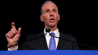 In this Monday, April 29, 2019 file photo, Boeing Chief Executive Dennis Muilenburg speaks during a news conference after the company's annual shareholders meeting at the Field Museum in Chicago. Boeing has taken the chairman title away from CEO Dennis Muilenburg as the aircraft maker continues to struggle with fallout from two deadly plane crashes, Friday, Oct. 11, 2019.