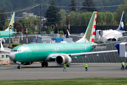 In this Wednesday, May 8, 2019 file photo, workers stand near a Boeing 737 MAX 8 jetliner being built for American Airlines prior to a test flight in Renton, Wash. The union representing Southwest Airlines pilots is suing Boeing and calling the grounded 737 Max unsafe. The Southwest Airlines Pilots Association said on Monday, Oct. 7, 2019 it filed a lawsuit against Boeing that Boeing rushed the plane into service and misled pilots by saying it was little different than previous versions of the 737. The union says those claims turned out to be false.