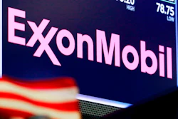 In this April 23, 2018, file photo, the logo for ExxonMobil appears above a trading post on the floor of the New York Stock Exchange. New York’s attorney general is accusing Exxon Mobil of lying to investors about how profitable the company will remain as governments impose stricter regulations to combat global warming. The lawsuit is set to go to trial Tuesday, Oct. 22, 2019.