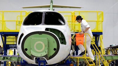 This July 30, 2019 shows a HondaJet Elite aircraft in production at the Honda Aircraft Co. headquarters in Greensboro, N.C. Nearly four years after delivering its first jet, Honda is facing decisions as the company better known for cars and lawnmowers considers whether to sink billions more into its decades-in-the-making aircraft division.