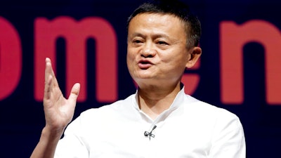 In this Oct. 12, 2018, file photo, Chairman of Alibaba Group Jack Ma speaks during a seminar in Bali, Indonesia. An annual survey of China’s wealthiest businesspeople found they got richer this year despite a tariff war with Washington and slowing economic growth. The Hurun Report said the net worth of China’s richest 1,800 people rose 10% over 2018 to $1.4 billion. Ma, who retired last month as chairman of e-commerce giant Alibaba, was No. 1 with a fortune of $39 billion.