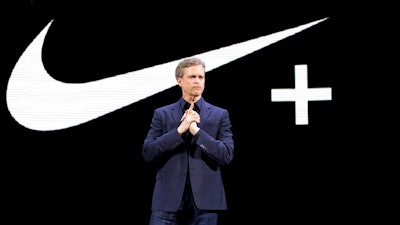 In this March 16, 2016, file photo Nike CEO Mark Parker speaks during a news conference in New York. Parker is stepping down early next year. He will be replaced by board member John Donahoe, who formerly ran e-commerce company eBay.