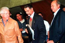 In this Sept. 29, 2000 file photo, leader of Mexico’s oil workers union Carlos Romero Deschamps, right, Labor Secretary Carlos Maria Abascal, center, and Pemex director Raul Munoz Leos, arrive to a media conference in Mexico City. Several Mexican news media are reporting the resignation of Romero Deschamps, who has been in the job since 1993. El Universal says the union of Pemex workers will issue a statement later Wednesday, Oct. 16, 2019.