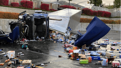 A semi-trailer driver, hauling beer, suffered serious injuries after his vehicle rolled over and crashed in a parking lot of a church in Sandy, Utah.