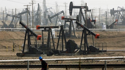 This Jan. 16, 2015, file photo shows pumpjacks operating at the Kern River Oil Field in Bakersfield, Calif. California Gov. Gavin Newsom on Saturday, Oct. 12, 2019, signed a law intended to counter Trump administration plans to increase oil and gas production on protected public land.
