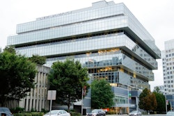 In this Sept. 12, 2019, file photo, cars pass Purdue Pharma headquarters in Stamford, Conn. Attorneys general representing nearly half the states and lawyers for more than 500 local governments on Friday, Oct. 4, 2019 blasted the terms of OxyContin maker Purdue Pharma’s offer to settle thousands of lawsuits over the toll of the nation’s opioids crisis.