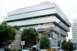 In this Sept. 12, 2019, file photo, cars pass Purdue Pharma headquarters in Stamford, Conn. OxyContin maker Purdue Pharma paid its CEO $9 million and its board chairman nearly $4 million in the 12 months before the company's bankruptcy filing last month, according to financial documents filed with the bankruptcy court this week.