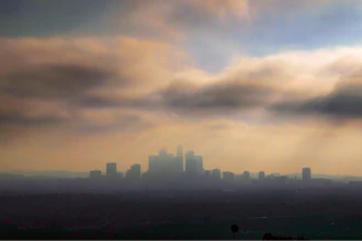 In this Oct. 26, 2018, file photo, downtown Los Angeles is shrouded in early morning coastal fog and smog.