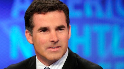 In this March 31, 2011, file photo, Kevin Plank, founder and CEO of Under Armour, appears on the 'America's Nightly Scoreboard' program on the Fox Business Network, in New York. Plank will step down as CEO in the new year to become the company’s executive chairman and brand chief. Patrik Frisk, president and chief operating officer, will become only the second CEO of Under Armour since the athletic gear company was founded in 1996.