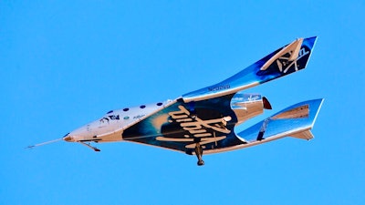 In this Dec. 13, 2018 file photo, Virgin Galactic aircraftVSS Unity reaches space for the first time during its fourth powered flight from Mojave Air and Space Port, Calif. Boeing plans to invest $20 million in Virgin Galactic as the space tourism company nears its goal of launching passengers on suborbital flights. The companies announced the investment Tuesday, Oct. 8, 2019, saying they will work together on broadening commercial access to space and transforming global travel technologies. Virgin Galactic has conducted successful test flights of its winged rocket ship at Mojave, California, and is preparing to begin operations at Spaceport America in New Mexico.