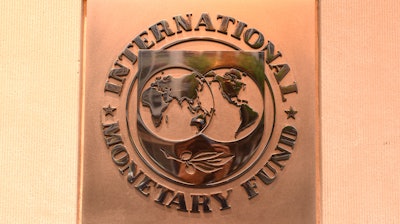 Emblem of International Monetary Fund on its Headquarters 2 Building in Washington DC.