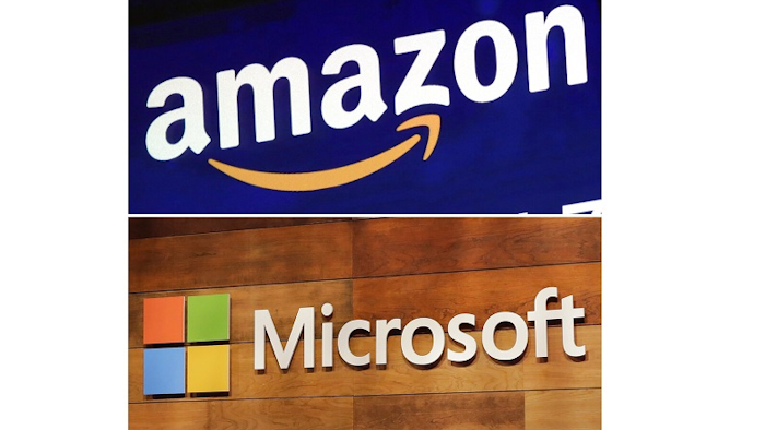 This combination of file photos shows the logos for Amazon, top, and Microsoft. . Amazon is protesting the Pentagon’s decision to award a huge cloud-computing contract to Microsoft, citing “unmistakable bias” in the decision. Amazon’s competitive bid for the “war cloud” drew criticism from President Donald Trump and its business rivals.