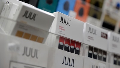 In this Dec. 20, 2018 file photo, Juul products are displayed at a smoke shop in New York.