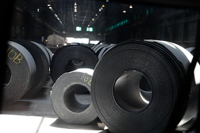 In this June 28, 2018, file photo, rolls of finished steel are seen at the U.S. Steel Granite City Works facility in Granite City, IL.