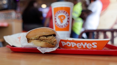 This Aug. 22, 2019 file photo shows a chicken sandwich at a Popeyes restaurant in Kyle, TX.