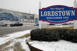 In this Nov. 27, 2018 file photo, a banner depicting the Chevrolet Cruze model vehicle is displayed at the General Motors' Lordstown plant in Lordstown, OH.