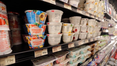 This July 11, 2018 file photo shows yogurt on display at a grocery store in River Ridge, LA.