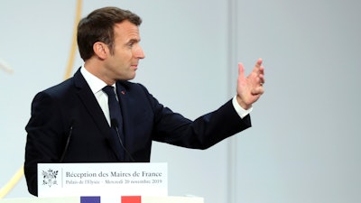 France's President Emmanuel Macron delivers a speech at the Elysee Palace, during a meeting with France's mayors in Paris on Wednesday, Nov. 20.