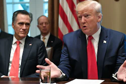President Donald Trump, right, speaks as he sits next to Sen. Mitt Romney, R-Utah, left, as they participate in a meeting in the Cabinet Room of the White House in Washington on Friday, Nov. 22 on youth vaping and the electronic cigarette epidemic.